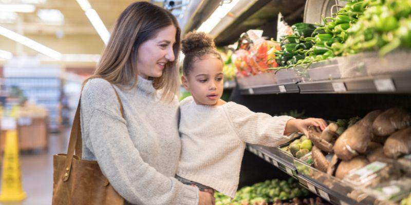 a-mother-and-toddler-enjoying-grocery-shopping-experience