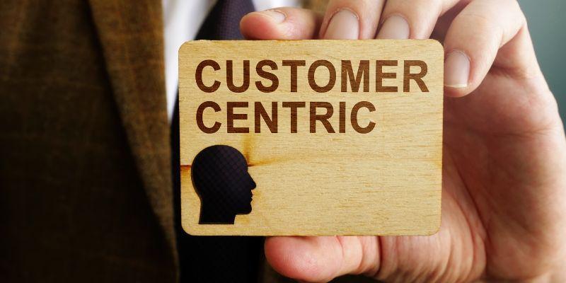 implementing-a-customer-centric-strategy-on-mentioned-on-a-wooden-block