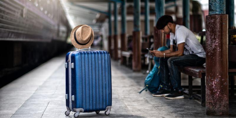 passenger-waiting-at-train-station-with-luggage