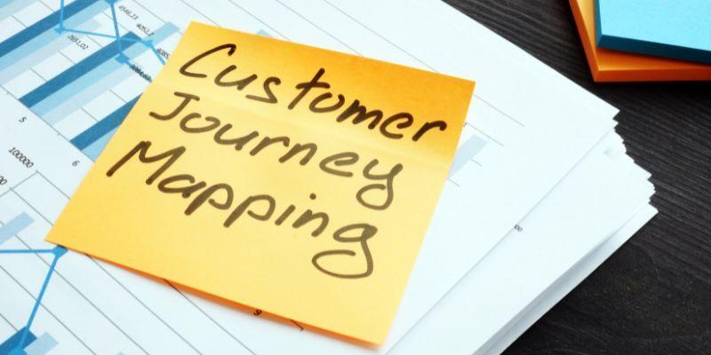 Customer-journey-mapping-sticky-note-on-paper